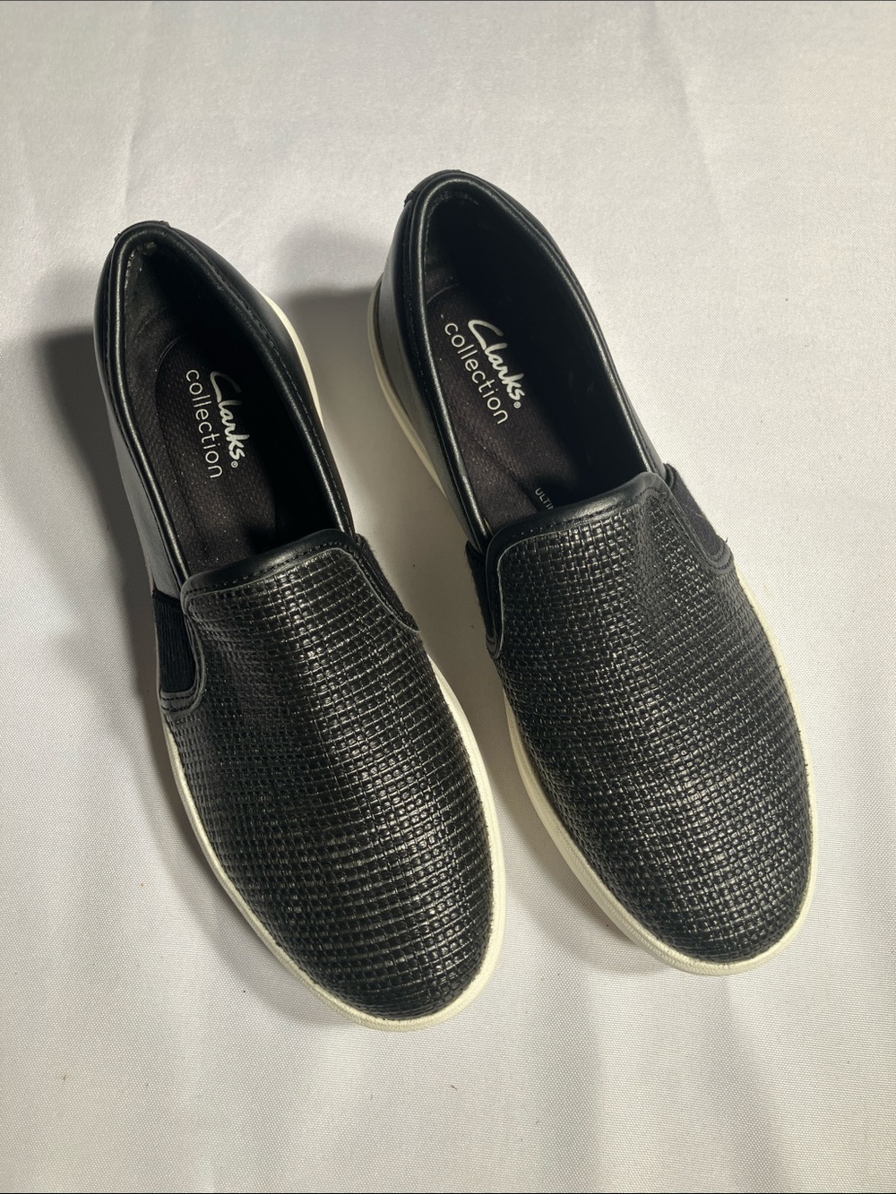 Clarks Black Textured Slip-On Loafers with White Sole